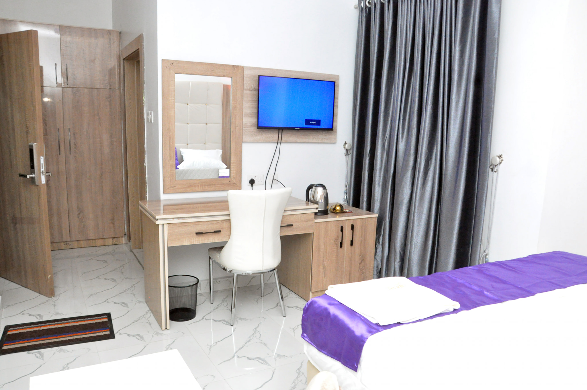 New Day Hotel and Suites