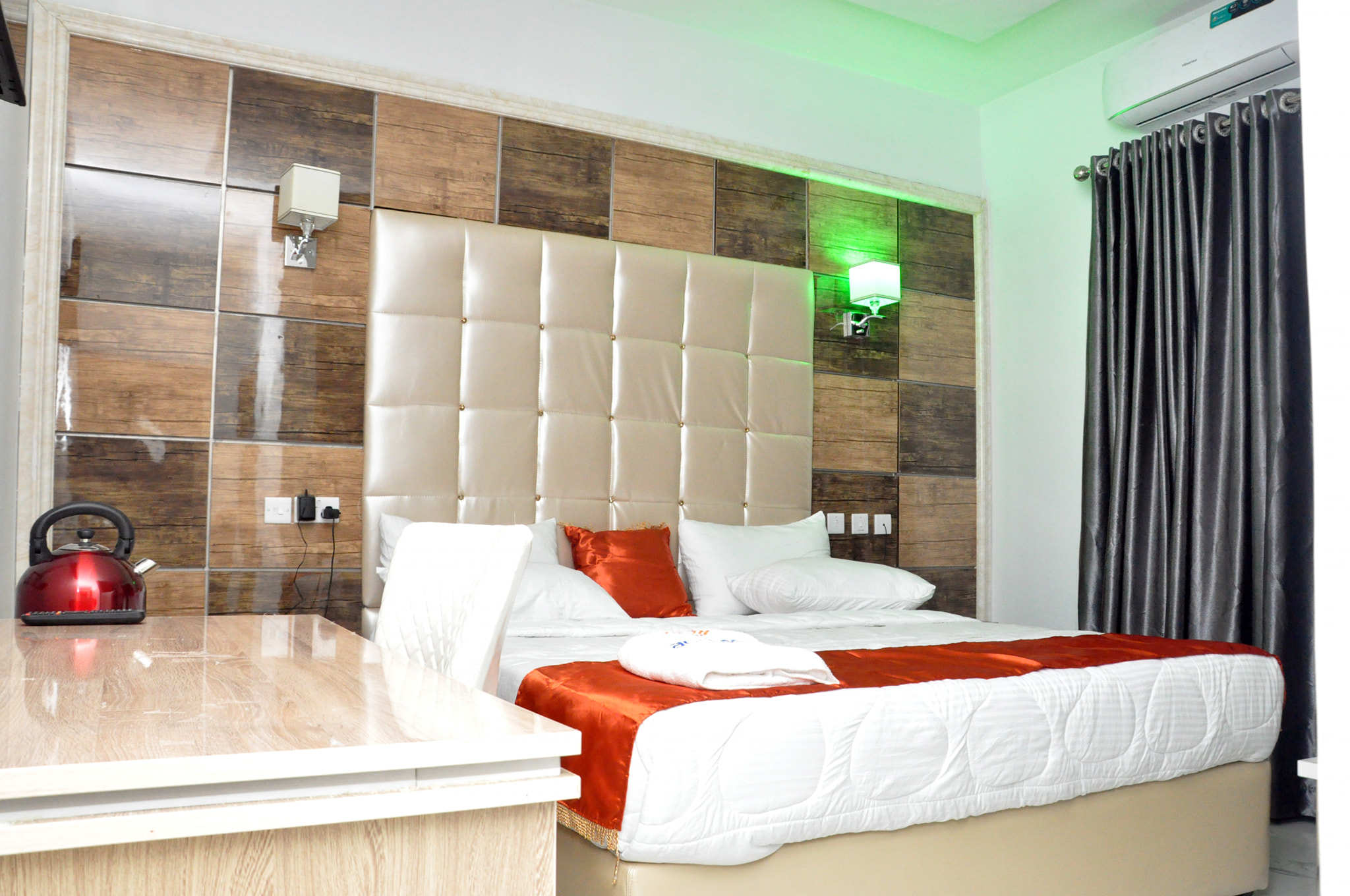 New Day Hotel and Suites