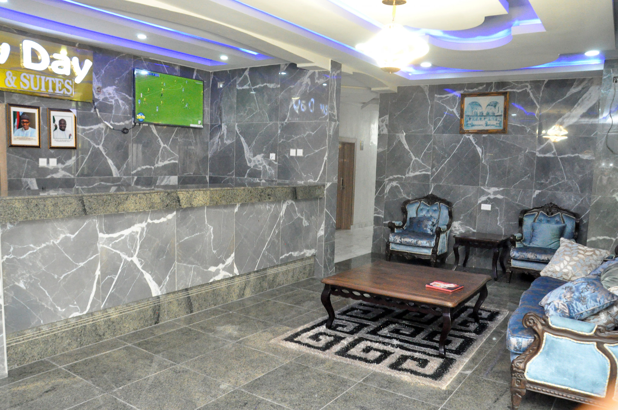 New Day Hotel and Suites