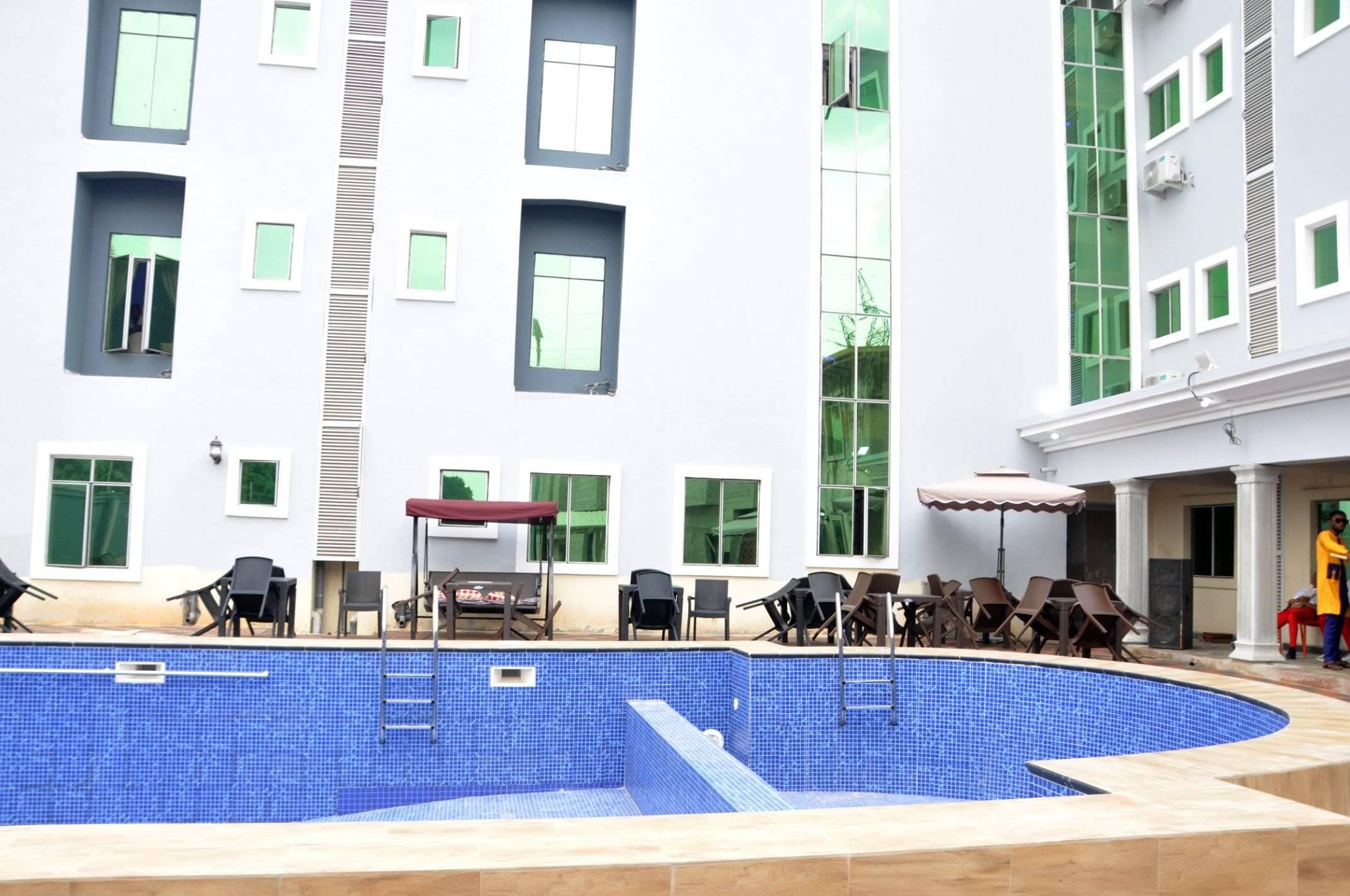 New Day Hotel and Suites